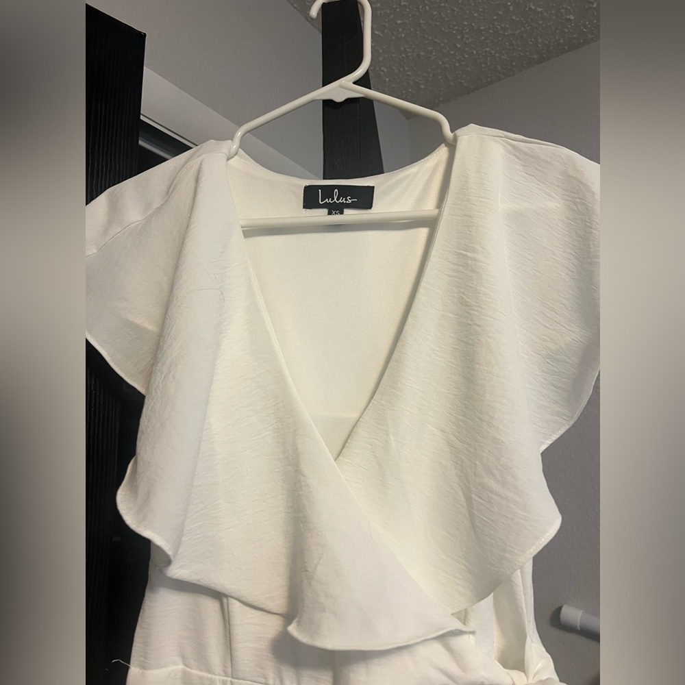 White Lulus jumpsuit. Wide leg bottoms.